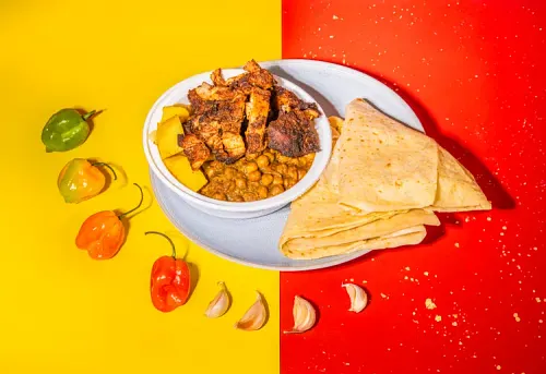 Caribbean curry chicken with chickpeas and roti