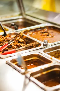 Slow-cooked oxtail and curry trays ready to serve